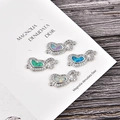 Détail de connecteurs cœur en argent avec opale synthétique et pierres de zircon - Connecteur Double Cœur - Bleu (Opale Bleue) / Argent