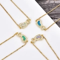 Détail de bracelets à chaîne ajustable avec cœurs en opale et micropavage de zircons - Bracelet Double Cœur - Bleu (Opale Bleue) / Or