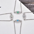 Silver evil eye bracelets with colorful opal stones and sparkling cubic zirconia charms - Blue Opal / White Gold Eye Bracelet