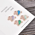 Elegant heart-shaped opal charms with rose gold finish and sparkling zirconia details - Rose Gold Heart Blue Opal Connector
