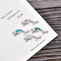 Handmade dolphin charms in four colors with opal inlay for DIY jewelry bracelet making - Blue Opal / Platinum Dolphin