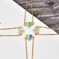 Detail of heart pendants with opal and cubic zirconia on adjustable bracelets - Gold Heart Blue Opal Bracelet