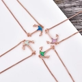 Close-up of four anchor necklaces with colorful synthetic opal in rose gold finish - Anchor Bracelet-Blue Opal / Rose Gold
