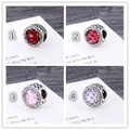 Macro view of S925 silver charms with colorful gemstones and heart patterns - Deep Red Faceted (S011-1)