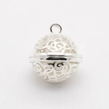 Detailed macro view of silver hollow bell pendant with intricate floral DIY craft pattern - Hollow Sphere Pendant / Silver