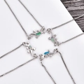 Handmade silver gecko pendant necklaces with colorful opal in green, blue and purple - Blue Opal / White Gold Gecko Bracelet