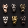 Detailed view of alloy dragon head charms in six metallic finishes for DIY jewelry - Multicolor
