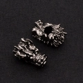 Macro detail of gunmetal dragon head alloy beads for DIY jewelry and bracelets - Gun Black