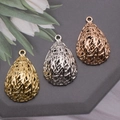 Detailed view of teardrop heart-nest pearl pendants in gold, silver, and rose gold finishes - Gold / Large Bird's Nest