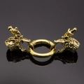 Macro detail of golden dragon head spring clasp for jewelry and creative keychains - Antique Gold Dragon