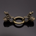 Macro shot of vintage brass dragon head clasp with spring ring for DIY crafts - Antique Bronze Dragon