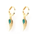 Detail of golden wing earrings featuring green enamel inlay and polished hoop charms - Gold Green