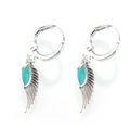 Detailed close-up of silver-plated angel wing earrings with turquoise enamel inlay - Platinum Plated Green