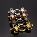 Veerringsluitingen met ramsschedel in vier metalen afwerkingen voor DIY-sieraden - Kleine Ramshoorn Schedel Stijl / Meerkleurig