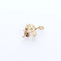 Detailed macro view of golden branch pendant with twin pearl settings and spiral pins - Light Gold