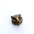 Detailed view of vintage gold leopard head bead for DIY jewelry making and bracelets - Cyan Bronze