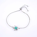 Adjustable silver chain bracelet with a fish pendant and teal heart opal stone - Tropical Fish / Platinum/Green