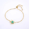 Adjustable golden box chain bracelet featuring a blue opal tropical fish charm pendant - Tropical Fish / Gold/Green