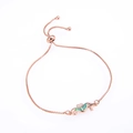 Rose gold adjustable seahorse bracelet with green opal inlay and cubic zirconia details - Rose Gold Green Double Seahorse Artificial Opal