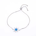 Adjustable silver sun charm bracelet with blue opal stone and zircon accents - Silver Tone Blue Sun/Starfish Opal
