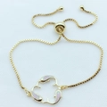 Detail of adjustable golden slider clasp and box chain on dolphin charm bracelet - Pink Opal Gold Plated