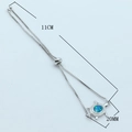 Bracelet ajustable tortue en argent avec opale bleue et halo de cristaux blancs - Bracelet Tortue de Mer