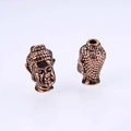 Detailaufnahme von Buddha-Kopf-Zwischenperlen aus Bronzelegierung für DIY-Schmuck - Antik-Roségold