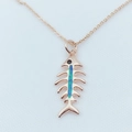Detail shot of rose gold fishbone pendant with blue opal inlay and black gemstone eye - Rose Gold / Blue (With Chain)