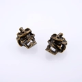 Detail of vintage zinc alloy skull beads with crown for punk style jewelry making - Cyan Bronze
