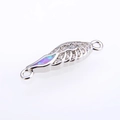 Macro detail of silver angel wing connector with opal and white cubic zirconia for DIY jewelry - Silver Pink Opal