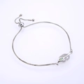 Detail of adjustable leaf bracelet featuring marquise opal and micro-pave cubic zirconia - Silver Chain White Synthetic Opal