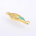 Makroansicht der flügelformigen Kupfer-Verbinder mit Zirkonia und Opal für DIY-Schmuck - Gold Grün Opal
