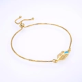 Detail of adjustable gold leaf bracelet with blue opal and cubic zirconia inlay - Gold Chain Blue Synthetic Opal