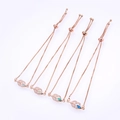 Detail of rose gold leaf bracelets with white, green, and blue opal stones - Rose Gold Chain Mixed Color Synthetic Opal