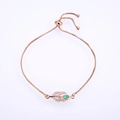 Detail of rose gold leaf bracelet with opal stone and zirconia on a box chain - Rose Gold Chain Green Synthetic Opal
