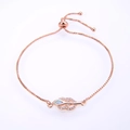 Detail of rose gold adjustable opal leaf bracelet with pavé cubic zirconia accents - Rose Gold Chain Pink Synthetic Opal