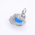 Detailed close-up of swan pendant with blue opal stone and micro-pave crystals - Platinum Blue Opal