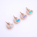 Rose gold swan pendant with opal inlay and zircon accents on white glossy surface - Rose Gold Mixed Opal Colors
