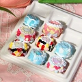 Handmade cream-style acrylic beads in dessert shapes like donuts on a ceramic tray - Price per Piece / Mixed