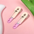 Set of two safety pin hair clips featuring a sweet cream to purple gradient finish - Rose Red