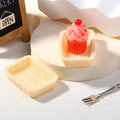 Miniature resin cupcake with cherry on pink frosting and two beige woven trays - Small / Off-white