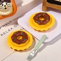 Macro detail of miniature chocolate donuts with sprinkles on yellow plates for DIY crafts - Yellow Plate Donut