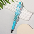 Blue DIY beaded pen featuring pink and white floral cream-style charms and faux pearls - Sky Blue