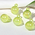 Macro detail of 15mm light green bubble glass beads with iridescent sequins for DIY crafts - Light Green