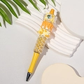 Creative beaded ballpoint pen in yellow and orange with resin dessert decor and pearls - Yellow