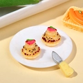 Miniature resin cupcakes with pink floral cream and small cheese-handle craft knife - Translucent Yellow Dotted Cake