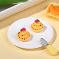 Miniature yellow resin cupcake toy with pink flower and green leaf for dollhouse decor - Solid Yellow Dotted Cake
