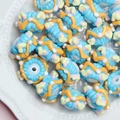 Blue DIY craft beads with orange waves and heart patterns for jewelry making - White Bead Blue Cream Yellow Ripples