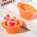 Macro detail of mini orange woven basket and pink Rody horse figurine for DIY crafts - Oval (Empty Basket) / Orange