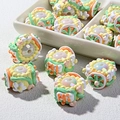 Pastel DIY beads with embossed heart and flower details and HI lettering for phone charms - Yellow Green Cream with Orange Hi